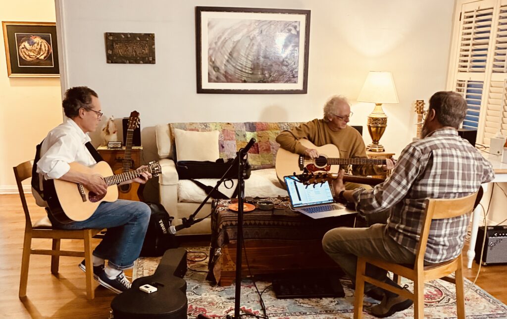 Keith Dorian and Charles playing guitars